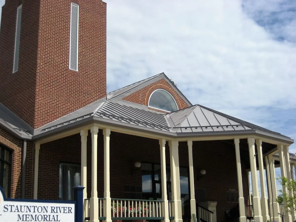 Skilled roofing craftsmen working on a residential roof in Oak Harbor